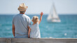 © Ruzana - Elderly caucasian male and young female watching sailboat on ocean from pier