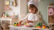 © DaniLana - Little girl pretending to be a chef in a toy kitchen
