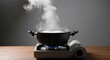 © zeni - Boiling Pot on Portable Gas Stove with Steam Rising.