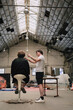 © Luciano Spinelli/Stocksy - Hair Styling Session in an Industrial Studio