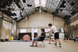 © Luciano Spinelli/Stocksy - Men Engage in a Creative haircut Project