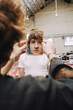 © Luciano Spinelli/Stocksy - Young Man Looking in Mirror