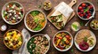 © Motiar - Various healthy salads and wraps arranged on a rustic wooden table