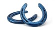 © Valentyna - Blue horseshoe set isolated on a white background as a professional lucky symbol and traditional equestrian icon. This
