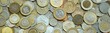 © Viktor - Big pile of coins from various money currencies. Treasure and numismatics concept