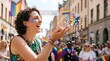 © tangmo.pa - Happy woman throwing colorful confetti at Stockholm Pride LGBTQ celebration parade
