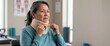 © Xenia - Mature woman adjusting cervical collar neck brace. Neck injury recovery and orthopedic support concept