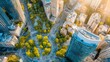 © Putra - Aerial view of city intersection with tall buildings and lush green trees