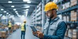 © The Little Hut - Warehouse worker in yellow hard hat using tablet computer on industrial storage shelves background