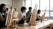 © velikiyzayats - Diverse group of teenage students painting on canvases in an art class studio, creative education concept for high school art workshop and artistic development