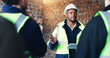 © peopleimages.com - Construction site, architecture and man with discussion, tablet for online schedule and connection. People, engineering and employees with teamwork, contractor and tech for renovation or conversation