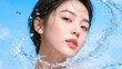 © tangmo.pa - Beautiful Asian woman with glowing skin during a fresh water splash closeup