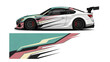 © Lailatul - Sleek race car with bold geometric wrap and dynamic color graphics.