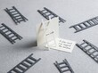 © Siti - Miniature Ladders Symbolizing Progress and Overcoming Challenges for Low Attention Span