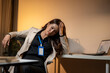 © apichat - Stressed business woman feeling exhausted from overworking