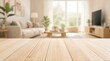 © TAN JESSADA - Empty Wooden Table Top with Blurred Cozy Minimalist Living Room Background
