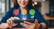 © Armin - Facial expression rating icons with a smartphone displaying red orange and green feedback options review assessment evaluation emoticon