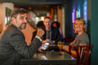 © Rawpixel.com - Business meeting in cozy bar.