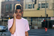 © Rawpixel.com - Young man talking phone outdoors.