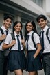 © Rawpixel.com - Smiling students in uniform outdoors.