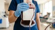 © Fadzkur - Medical professional holding a bag of donated blood in clinic