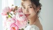 © yohaku - 芍薬ブーケと笑顔の日本人女性ポートレート