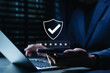 © Supatman - Cybersecurity and identity protection concept. enters password on smartphone with shield check icon, showing secure mobile login, MFA authentication, OTP verification, encrypted access, data privacy