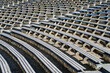 © K - Symmetrical empty timber seats at a stadium park auditorium zone built for public entertainment theater performances musical concerts and cultural festival activities
