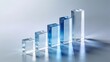© mostafizur - Clear and blue glass bar chart on white background, representing market segmentation and growth.