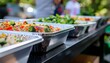 © Mbah Di  - Fresh Healthy Salads in Catering Trays at Outdoor Event Buffet