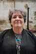 © Luciano Spinelli/Stocksy - Portrait of a positive Woman in an Industrial Setting