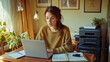 © Maryna - Tired young woman working on laptop at desk in cozy home office