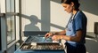 © Banyu - Woman working with dental tools tray.