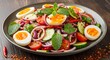 © Mbakar - Fresh garden salad with hard boiled eggs cucumber tomato onion and herbs