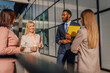 © Ljustina - Diverse business team having an outdoor corporate meeting