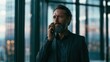 © Anatoll Paveel - Man with beard speaks on phone