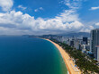 © Parilov - Aerial view Nha Trang Vietnam coastal skyline with skyscrapers at with vibrant colors and urban beach scape