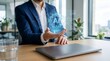 © Vactzone - AI integration in business technology concept with a businessman holding a virtual gear icon, automation systems, smart workflow processes, and enterprise innovation in digital