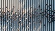 © timitinej - A large crowd crosses a wide striped intersection in a metropolitan area. The scene shows people moving in multiple directions under bright daylight, captured from a high angle