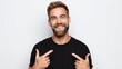 © VeretiLab - Confident man pointing at himself with a big smile, wearing a black t-shirt against white background
