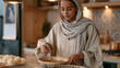 © forenna - Iftar preparation in a family kitchen with a teenager spooning harira soup into decorative ceramic bowls, rose water and vermicelli dessert cooling on the counter, Ramadan