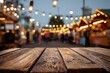© Oleksandr - Cozy wooden surface beside amber bulb string lights in a bustling festival night market