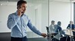 © Maryia - Male office professional speaking by phone near meeting room door highlights pre meeting planning, quick decision making and practical corporate communication.