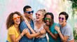 © Layla - Happy diverse group of cheerful friends laughing together outdoors under bright sunny skies, vibrant sunglasses, casual summer attire, joyful and united.
