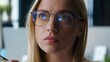 © Yuliia - Thoughtful Caucasian business woman deciding research analyze ideas solutions thinking European businesswoman female girl in glasses think young lady agent strategy choose decision dilemma in office