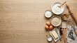 © Garina - Baking ingredients and tools on a rustic wooden table with copy space