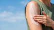 © AucArtStudio - Sunscreen lotion uv protection safety skincare arm summer outdoor beach. uv safety ray. skincare skin shield, health dermatology prevention, care protection sunblock, ultraviolet sun summer
