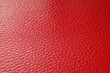 © Pixel-Shot - Vibrant red leather texture background with detailed grain pattern, close-up macro view of material surface for design and upholstery