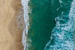 © SCLifestyle - Aerial scene capturing Seven Mile Beach near Forster, NSW, Australia, from directly above. The downward perspective highlights vibrant turquoise water and whitewash waves meeting the sandy shoreline.