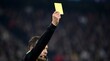 © Sakura Media - Soccer Referee Holding Up Yellow Card in Crowded Stadium